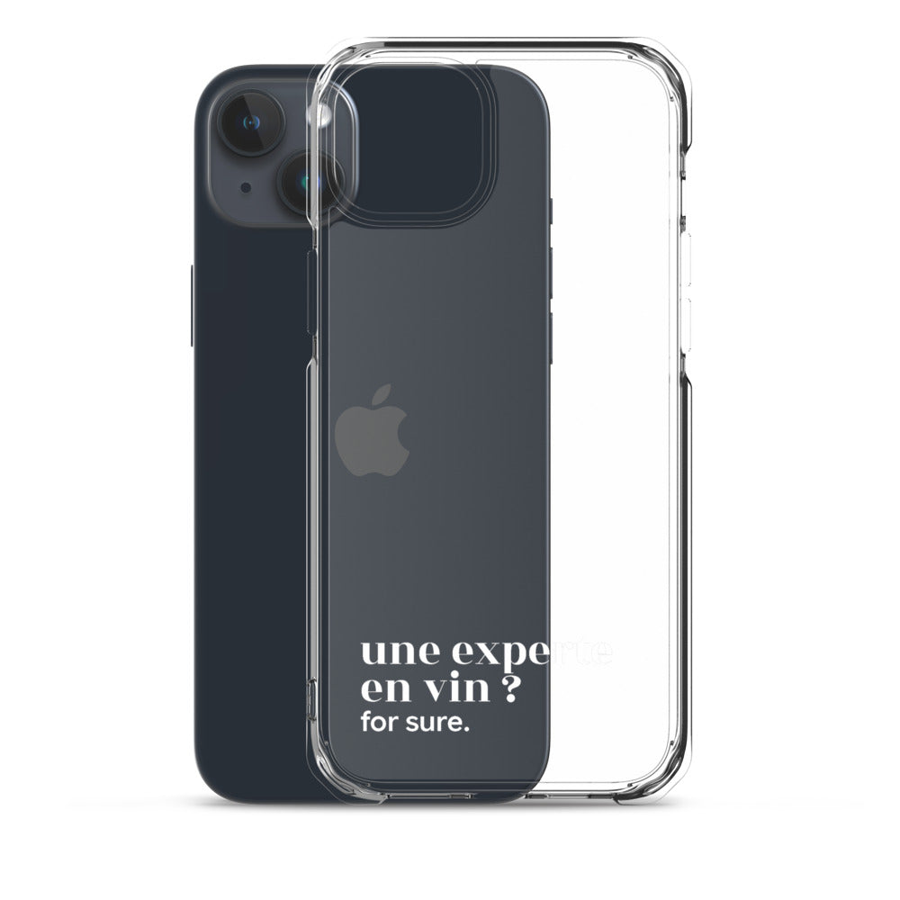 Coque iPhone 15 Plus, texte blanc, à côté du téléphone : « une experte en vin ? for sure. »