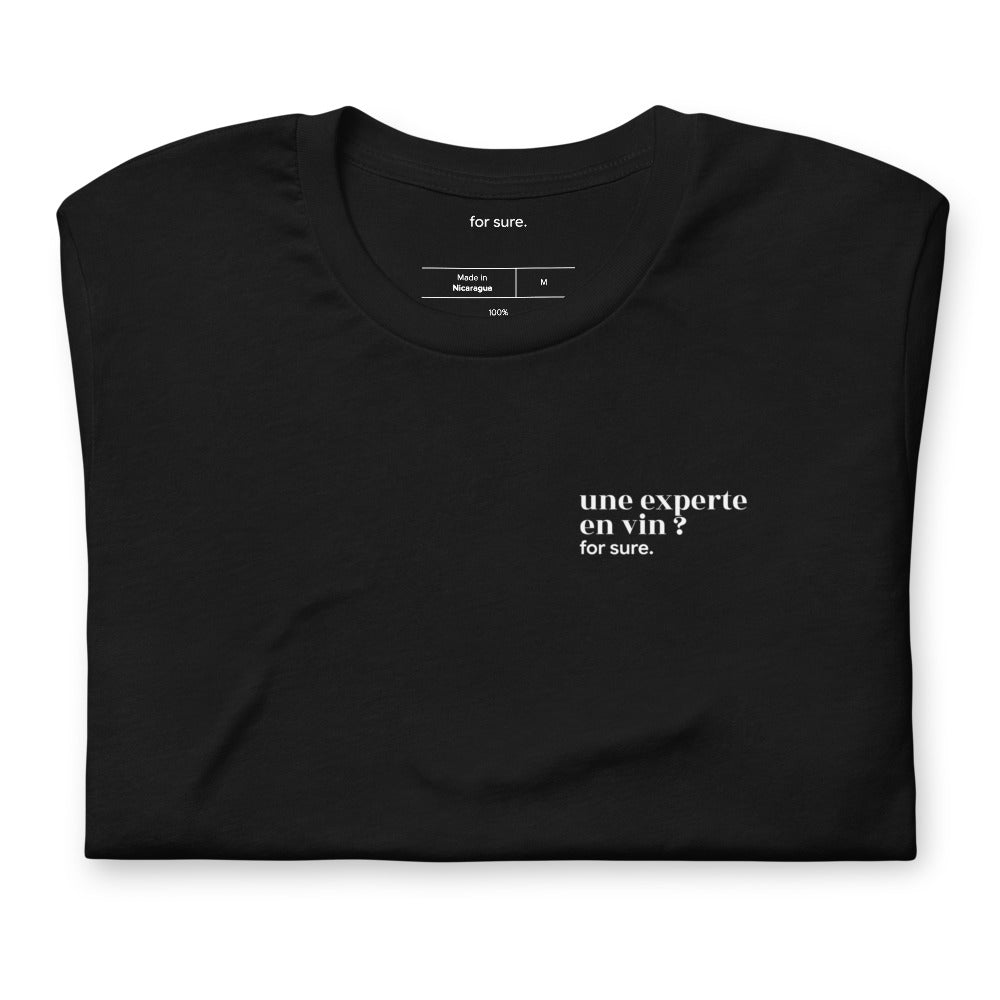 T-shirt noir « une experte en vin ? for sure. », plié