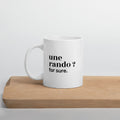 Mug blanc « une rando ? for sure. », sur une planche en bois